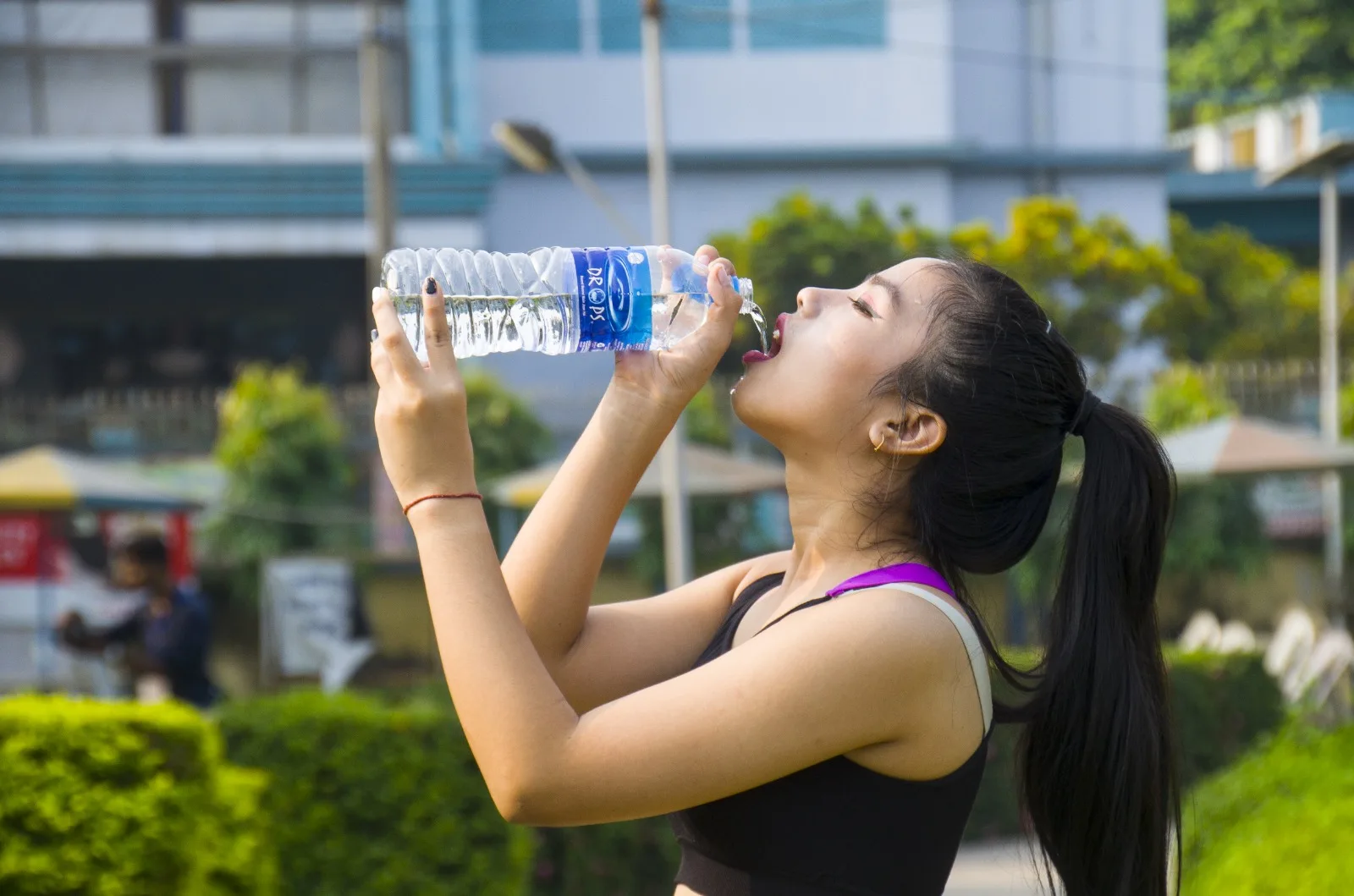 Girl Drinking Drops Water